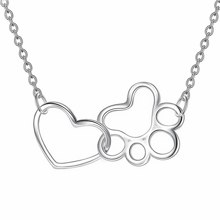 Siarah - Silver paw necklace with heart-shaped crystal pendant